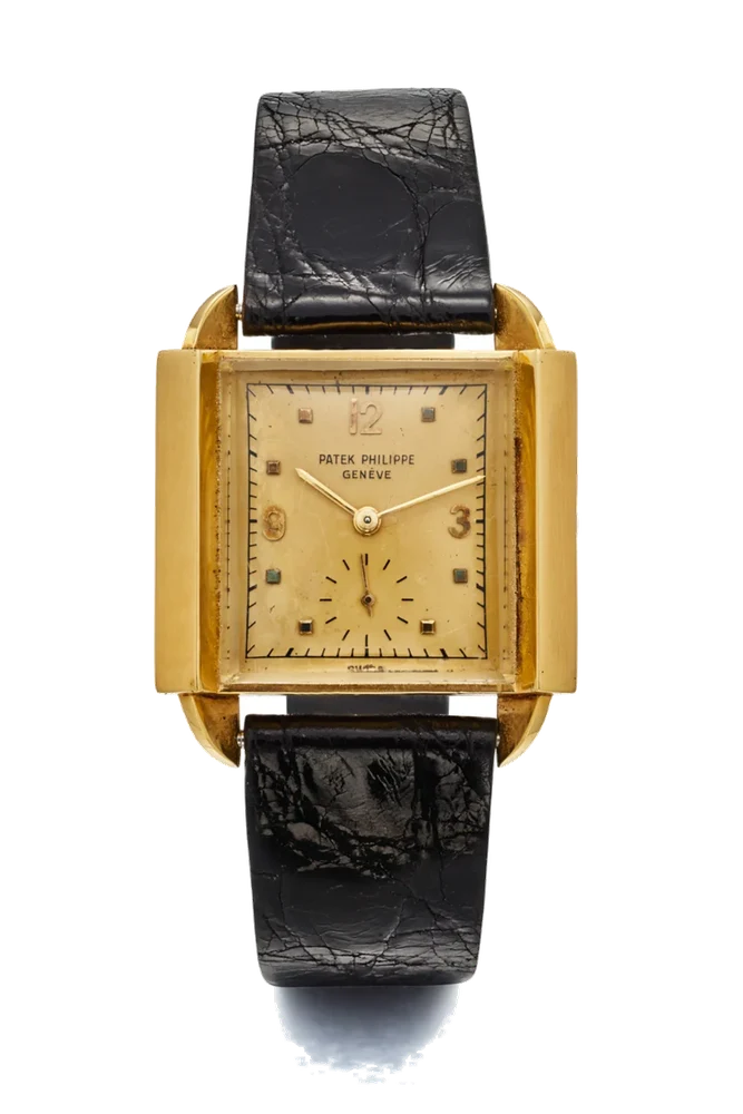 Patek Philippe PATEK PHILIPPE REF. 2425, LARGE LATERAL MOUNTINGS PROLONGED BY DOWNTURNED LUGS, SO-CALLED “SKATER”; 18K YELLOW GOLD kol saati