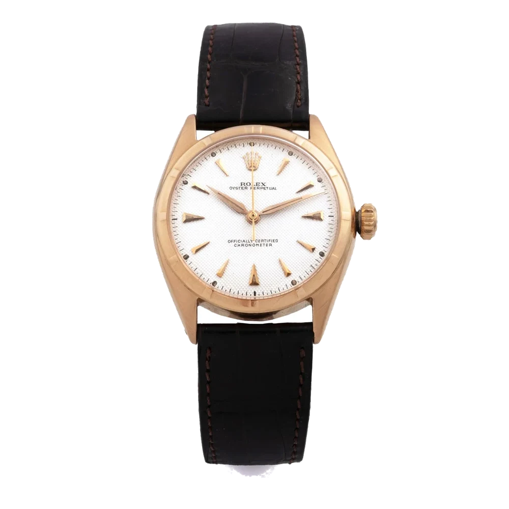 Rolex ROLEX, REF. 6085, RED OFFICIALLY A fine and rare, self-winding, 18k pink gold wristwatch. 34 mm kol saati