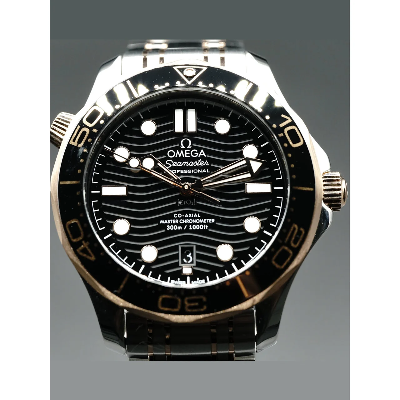 OMEGA Seamaster Diver 300M Co-Axial Master Chronometer Sedna Gold 210.22.42.20.01.002 210000018195 kol saati