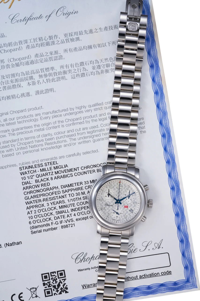 Chopard Ref. 11-8900-SB, chronograph, 1/10 second and minute recorders, date, integrated bracelet; “1000 Miglia”; stainless steel (“ ”) kol saati