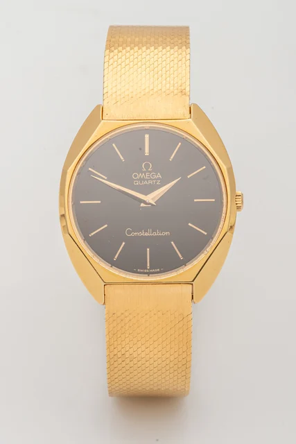 OMEGA Ref. 191.0012, quartz, black dial; “Constellation”; 18K yellow gold kol saati