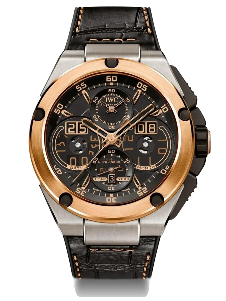 IWC IWC - REF. 379203, PERPETUAL CALENDAR, TITANIUM & PINK GOLD A fine and complicated, self-winding, titanium and pink gold perpetual calendar wristwatch with dual window date and month display. Belle montre-bracelet avec calendrier perpétuel chronographe à guichet en titane et or rose 18k. Boitier tonneau. Cadran squelette avec index batons appliques. Guichets pour indication du jour, mois et de l'année. Aiguilles en or rose. Mouvement automatique. kol saati