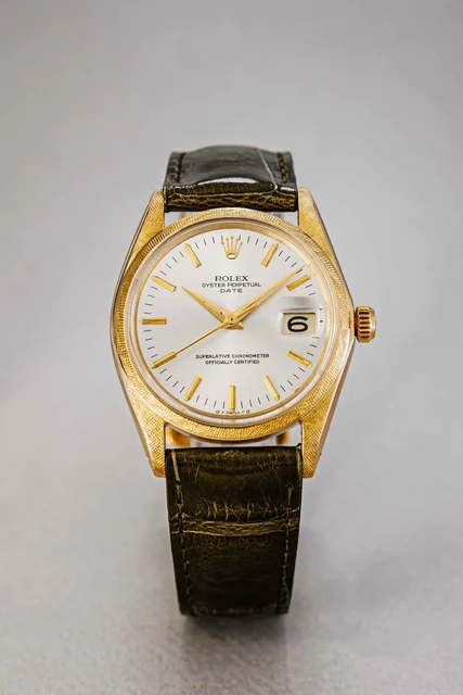 Rolex Date florentine sigma dial ref. 1502 kol saati