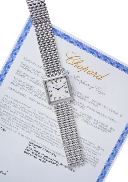 Chopard Ref. S16-3296-WB, silver “sunburst” dial, integrated bracelet; 18K white gold (“ ”
