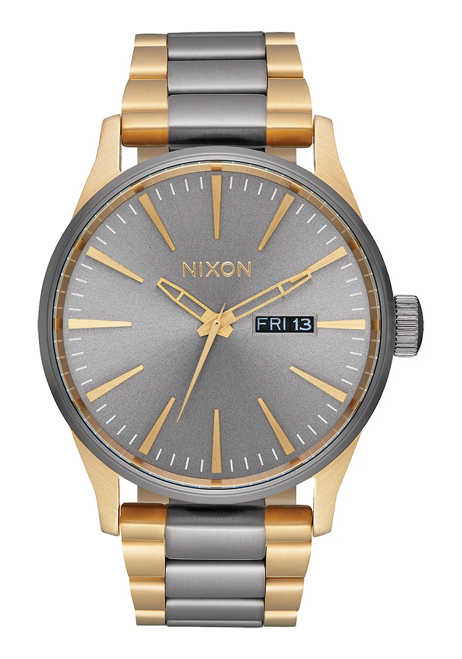 Nixon US Sentry Stainless Steel - Gunmetal / Gold A356-595-00 42 mm kol saati