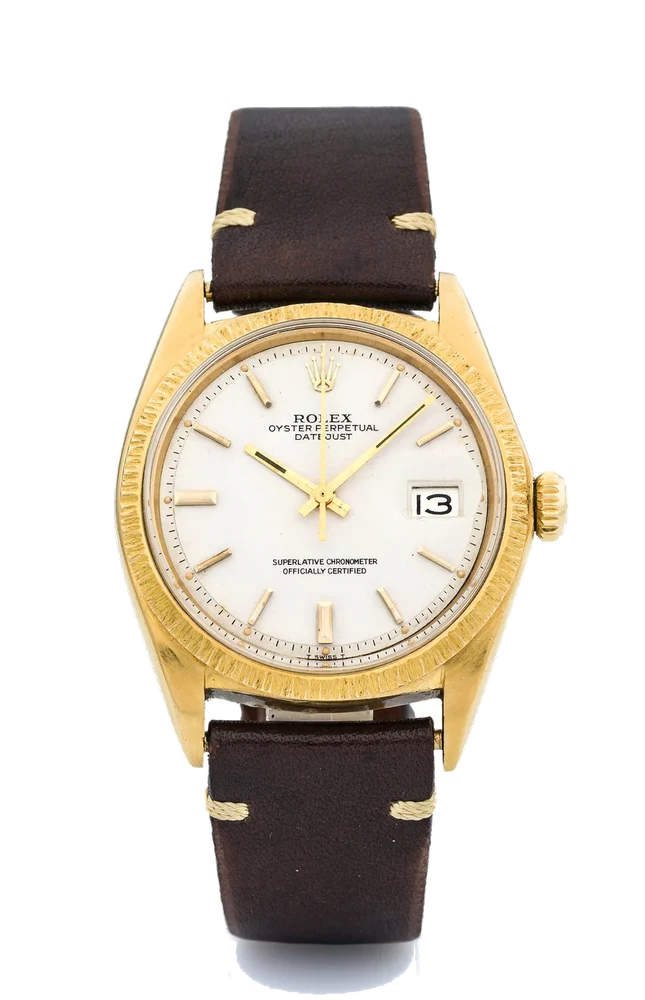 Rolex ROLEX, REF. 1607, DATEJUST, BARK-FINISH A fine and rare, self-winding, 18k yellow gold wristwatch with date. kol saati