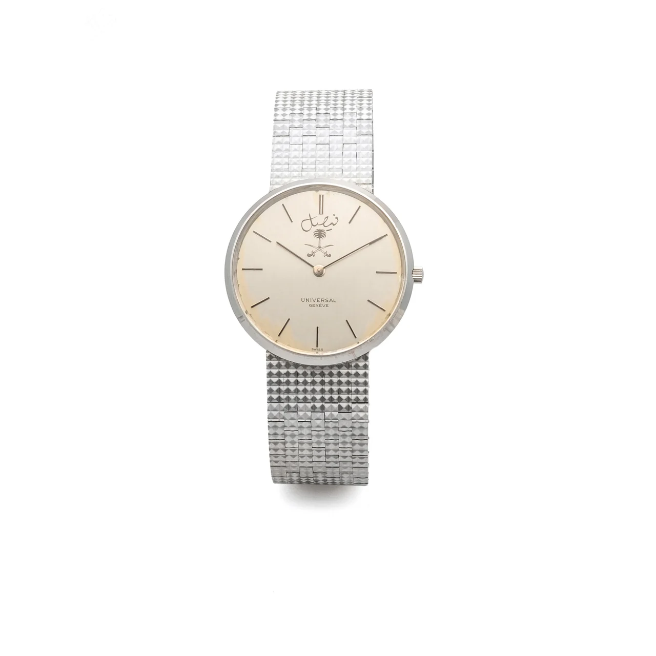 Universal Ref. 342002 / 1425, extra-thin, integrated bracelet, silver dial with “Saudi Arabia” emblem; 18K white gold kol saati