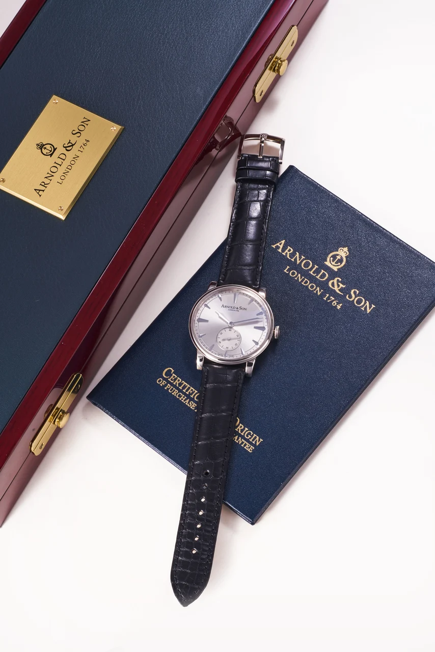 Arnold & Son Ref. 1LCAW.S03A.C111W, silver dial; “HMS1”; limited edition of 100 pieces; 18K white gold kol saati