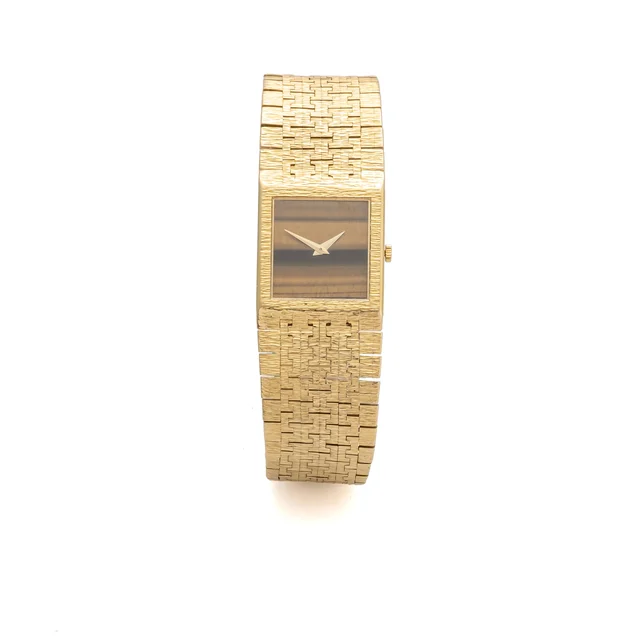 Piaget Ref. 9133 RA 6, tiger’s eye (quartz stone) dial; 18K yellow gold kol saati