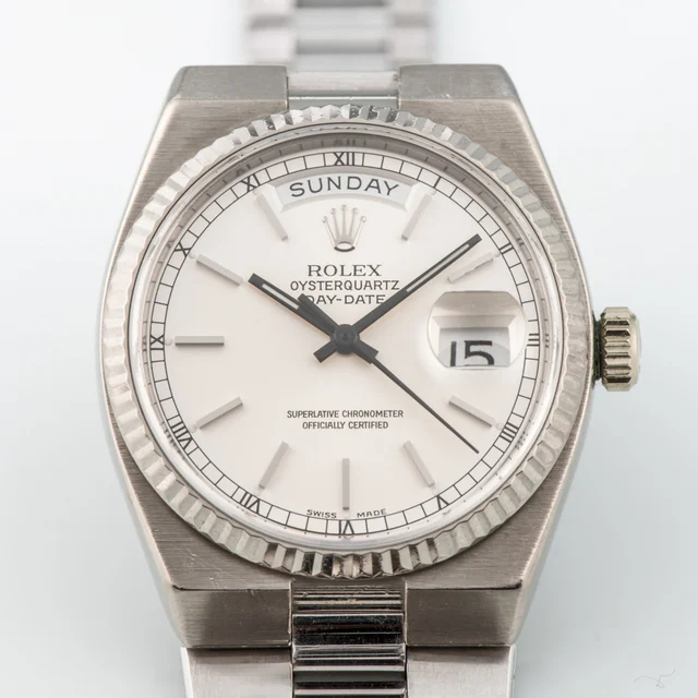 Rolex ROLEX REF. 19019, OYSTERQUARTZ, DAY-DATE, WHITE GOLD A fine, rare and unusual, 18k w