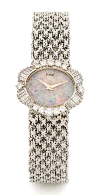 Piaget PIAGET, REF. 624, OPAL AND BAGUETTE DIAMONDS, WHITE GOLD A fine and rare manual win