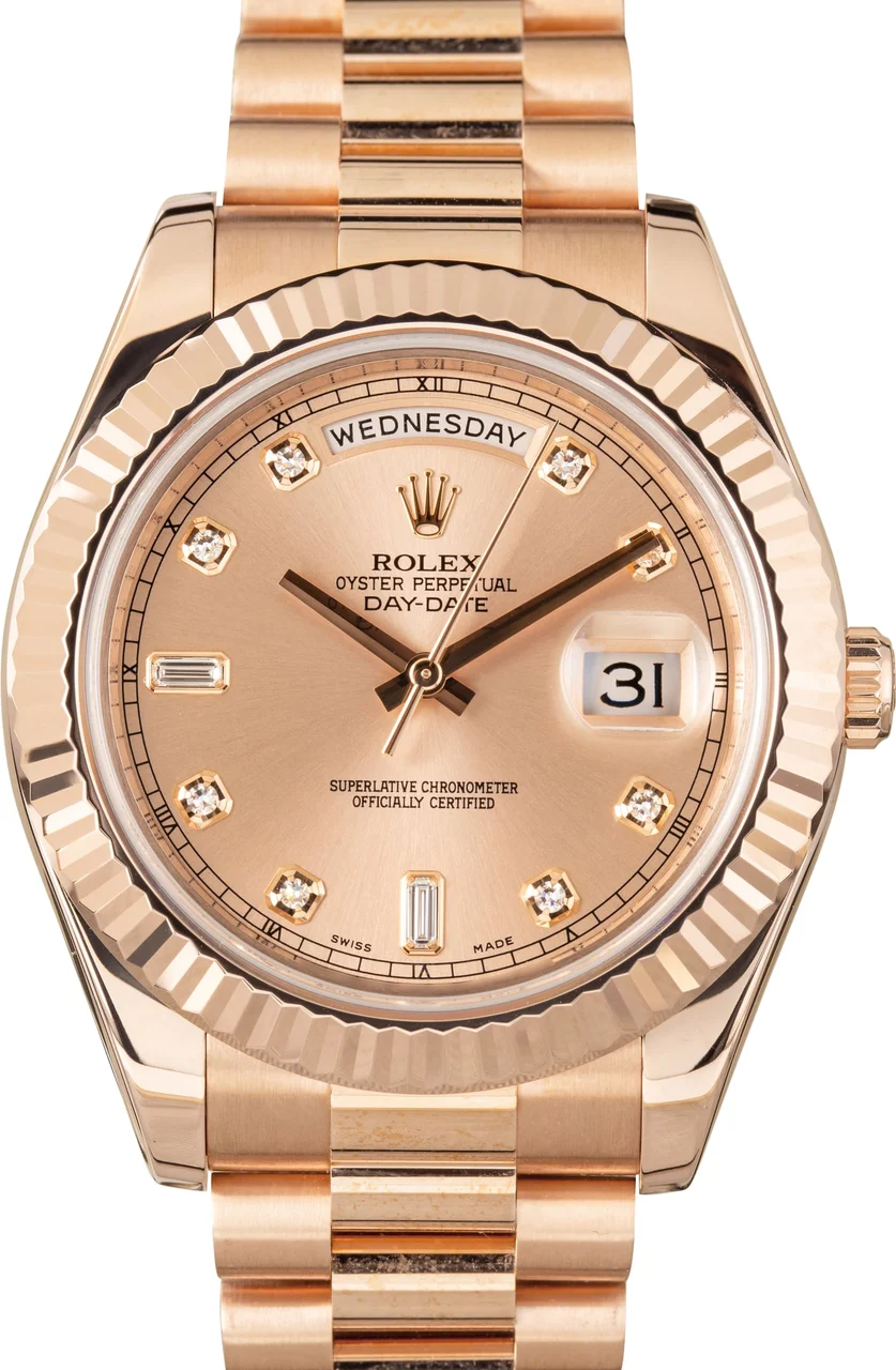 Rolex Ref. 218235, self-winding, centre-seconds, date, day black dial; “Day-Date”; 18K pink gold, diamonds, rubies 36 mm kol saati
