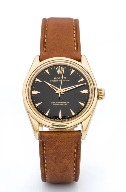 Rolex ROLEX, REF. 6548, OYSTER PERPETUAL A fine and very rare, small, self-winding, 18k pi