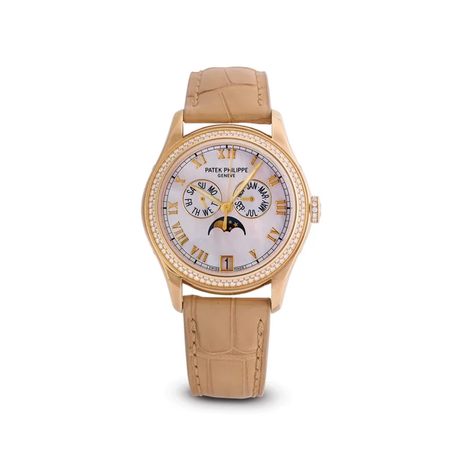 Patek Philippe PATEK PHILIPPE, REF. 4936J-001, ANNUAL CALENDAR, 18K YELLOW GOLD AND DIAMON