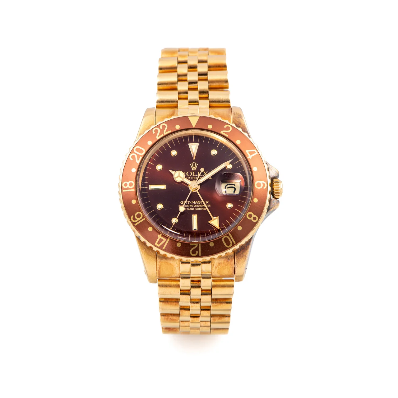 Rolex ROLEX REF. 16758 GMT-MASTER YELLOW GOLD BLACK TRANSITIONAL DIAL Very fine and rare, two-time zone, center seconds, self-winding, water-resistant, 18K yellow gold wristwatch with date. kol saati