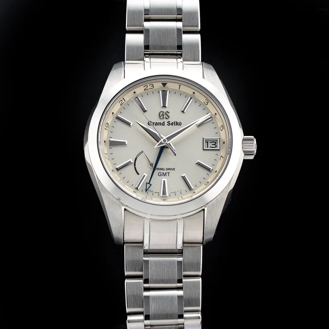 Grand Seiko Spring Drive GMT Champagne Dial 210009N33934 kol saati
