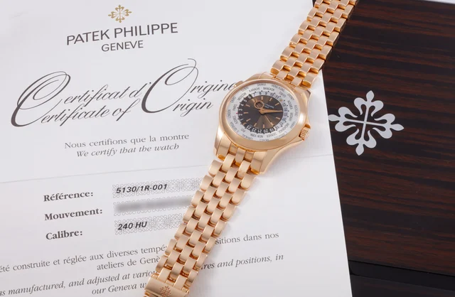 Patek Philippe PATEK PHILIPPE REF. 5130R, WORLD TIME, 18K PINK GOLD kol saati