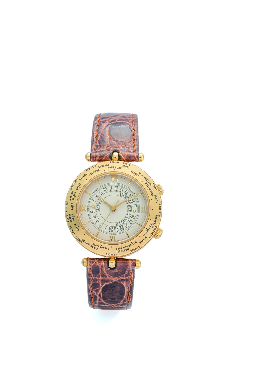 Van Cleef & Arpels Ref. 81221, centre-seconds, alarm, World Time; limited edition of 398 pieces; “Traveler”; 18K yellow gold kol saati