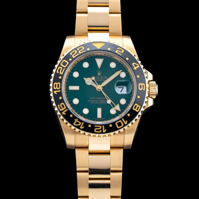 Rolex GMT Master II Anniversary Green Dial 210009N38672 kol saati