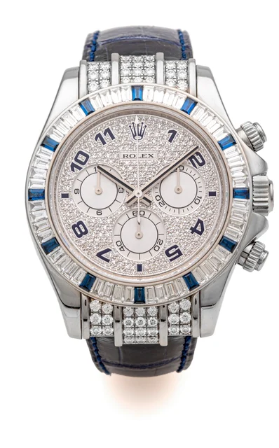 Rolex ROLEX REF. 116599 DAYTONA BAGUETTE DIAMOND AND SAPPHIRE WHITE GOLD A very fine and r