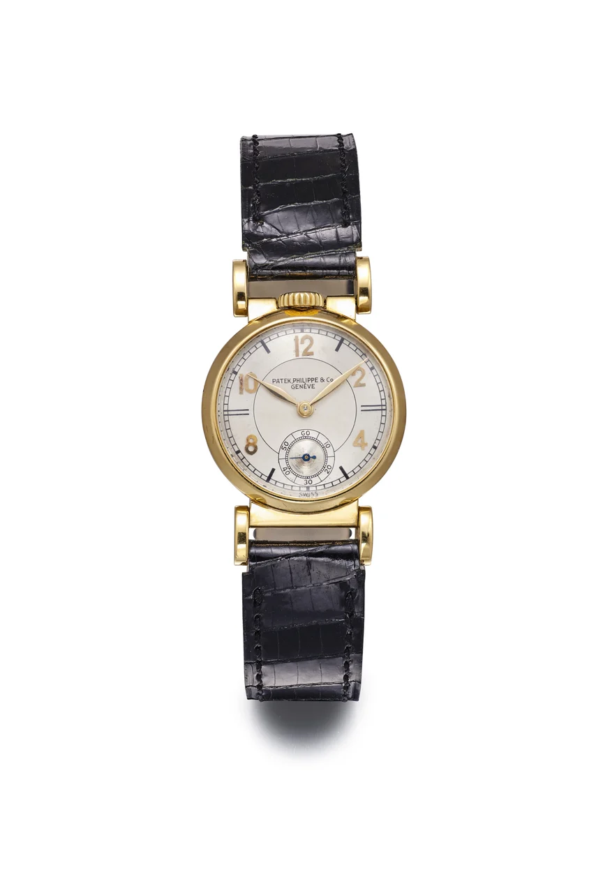 Patek Philippe PATEK PHILIPPE REF 421, MANUAL-WINDING WRISTWATCH WITH MOBILE LUGS AND TOP-WINDER; 18K YELLOW GOLD kol saati