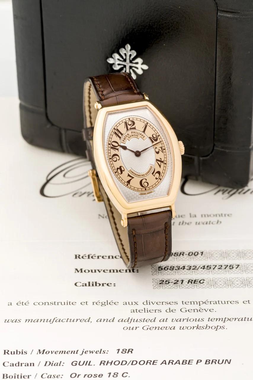 Patek Philippe PATEK PHILIPPE, REF. 5098R Fine and rare, quartz, 18k yellow gold and diamond set lady's wristwatch with diamond dial. kol saati