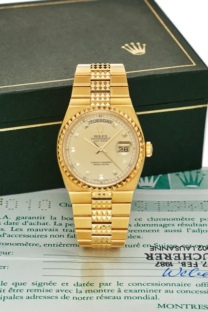 Rolex ROLEX REF. 19028; “OYSTERQUARTZ DAY-DATE”; 18K YELLOW GOLD kol saati