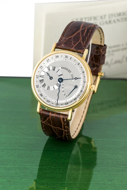 Breguet BREGUET, REF. 3680, POWER RESERVE A very fine, self-winding, 18k yellow gold wrist