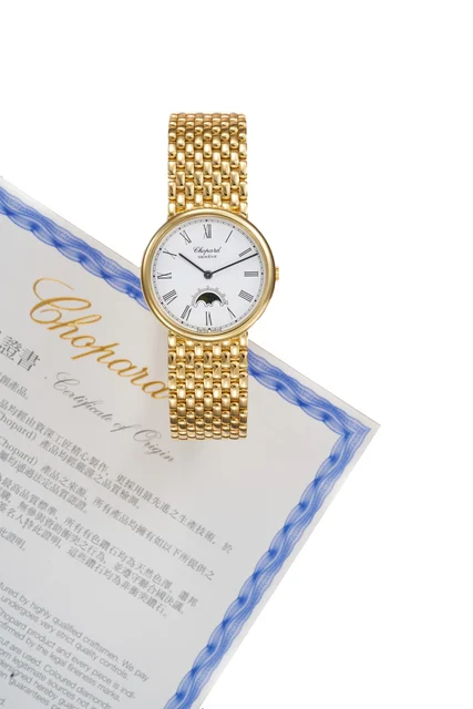 Chopard Ref. 26-2848-YB, moon phases, integrated bracelet; “Luna d’Oro”; 18K yellow gold (