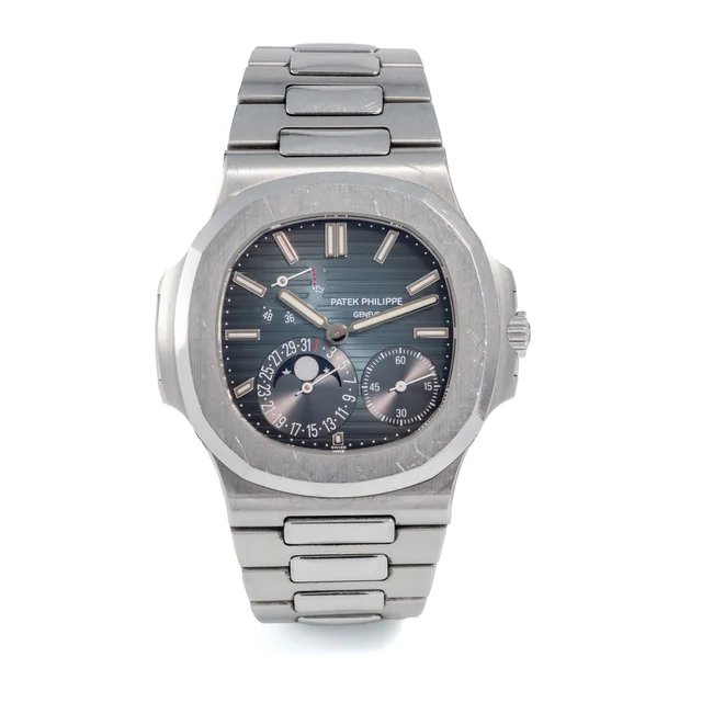 Patek Philippe PATEK PHILIPPE, REF. 5712/1A-001, NAUTILUS POWER RESERVE MOONPHASES, POINÇO