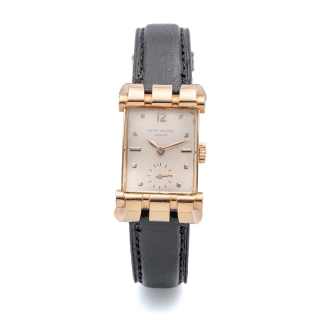 Patek Philippe PATEK PHILIPPE REF. 2471, TRIPLE-BODIED OVERHANGING CURVED AND FLARED LUGS,