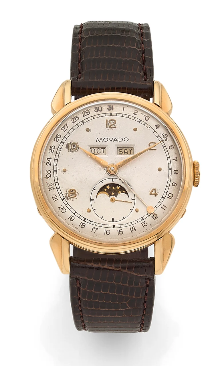 Movado Ref. 4920, triple date à guichets (with apertures), moon phases; “Calenderno”; 18K yellow gold kol saati
