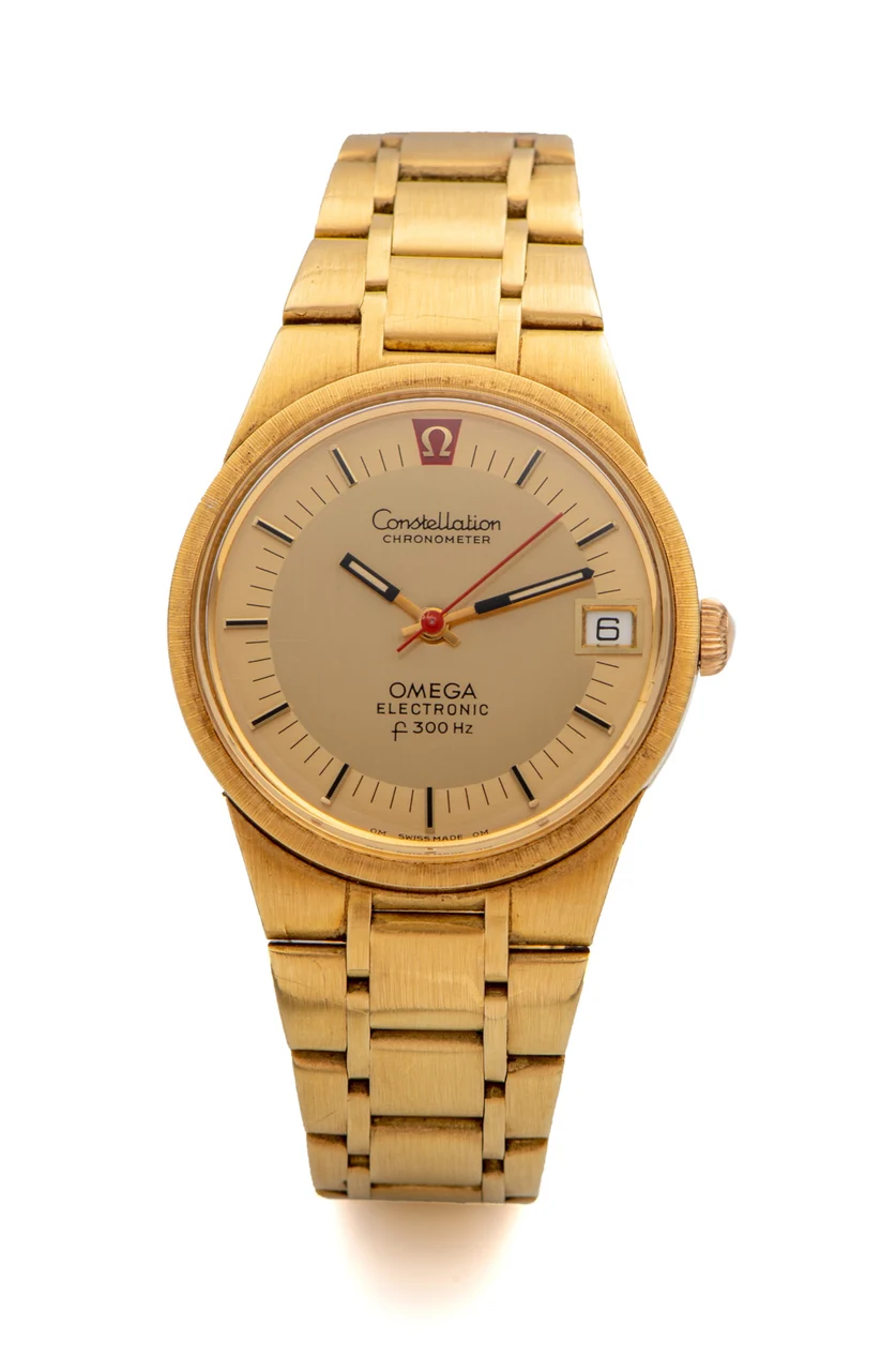 OMEGA Ref. 198.7264, electronic centre-seconds, date, gold colour dial, integrated bracelet; “Electronic”; 18K yellow gold kol saati