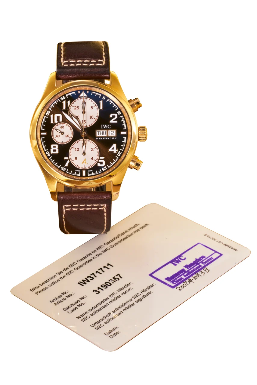 IWC Ref. 3717-11, chronograph, minute and hour recorders, date, day; “Pilot”, “Edition Antoine de Saint-Exupéry”; limited edition of 250 pieces; 18K pink gold kol saati