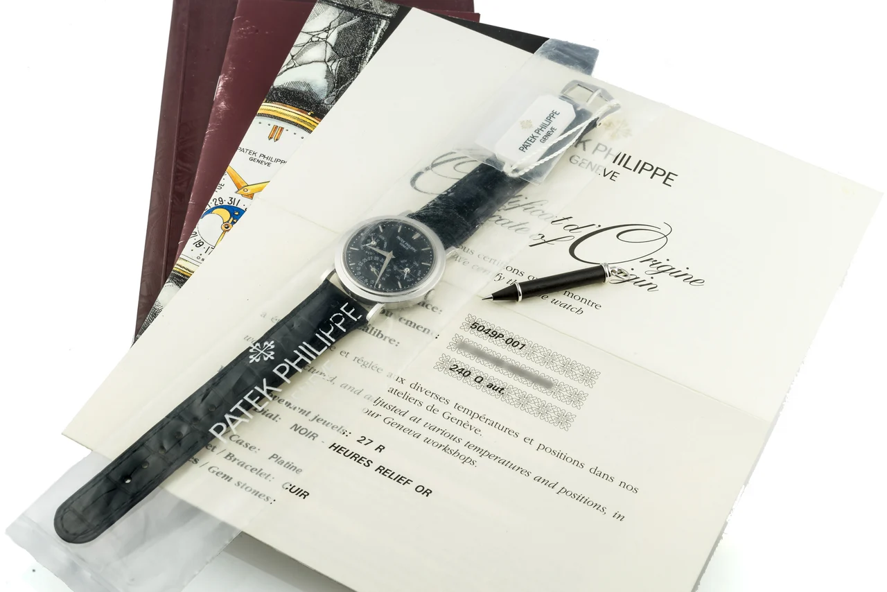 Patek Philippe PATEK PHILIPPE REF. 5049 PERPETUAL CALENDAR PLATINUM LIMITED EDITION, 20 PIECES MADE Very fine and extremely rare, self-winding, platinum wristwatch with perpetual calendar and moon phases. kol saati