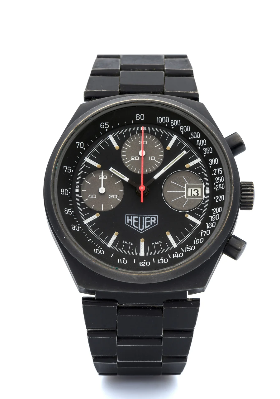 Heuer HEUER, REF. 13 1, CHRONOGRAPH A fine, black coated, manual wind, stainless steel chronograph wristwatch with date. kol saati