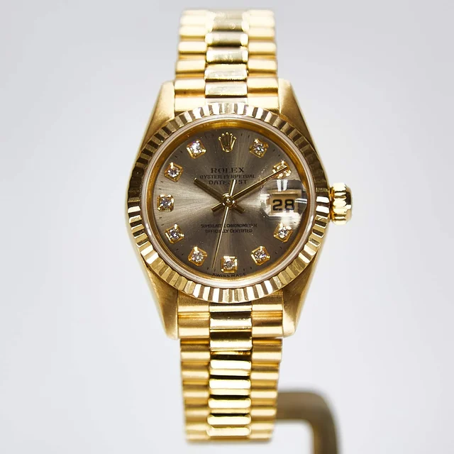 Rolex Day-Date 210000008450 kol saati