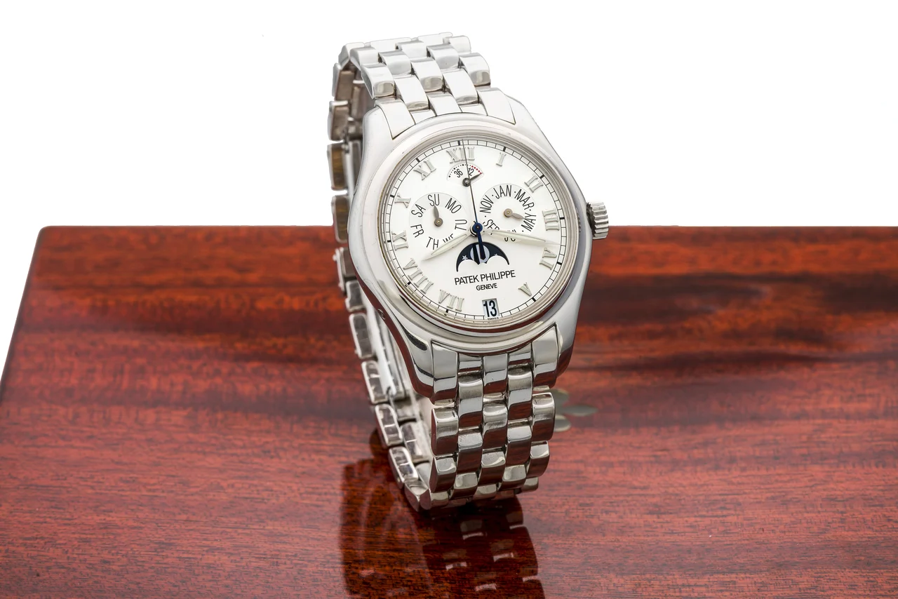 Patek Philippe PATEK PHILIPPE, REF. 5036/1G, ANNUAL CALENDAR A fine, self-winding, 18k white gold calendar wristwatch with moonphase and power reserve. kol saati