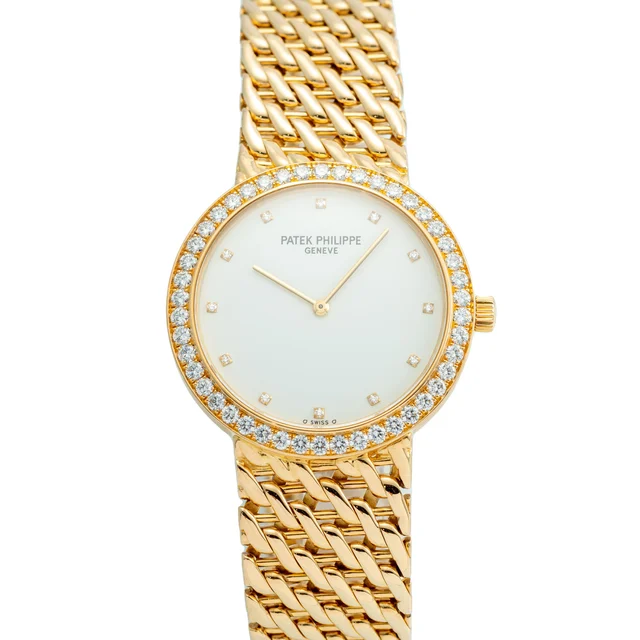 Patek Philippe Ref. 5006 / 17, Diamond-set Bezel, Integrated Bracelet; 18K Yellow Gold kol