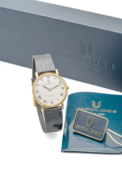 Universal UNIVERSAL, REF. 151.11661, CALIBER 66, YELLOW GOLD kol saati