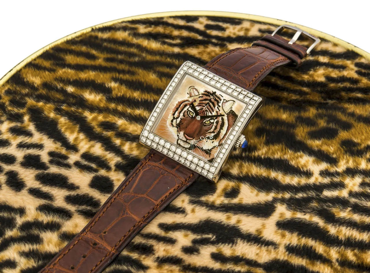Corum Buckingham CORUM BUCKINGHAM REF. 055.182.69 WHITE GOLD AND DIAMONDS LIMITED EDITION, 18/50 A very fine manual-winding 18K white gold diamond-set wristwatch with mother-of pearl dial with tiger painting. kol saati