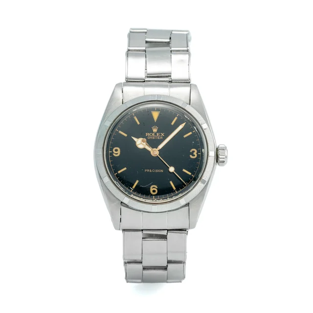 Rolex ROLEX REF. 6427, MANUAL-WINDING, CENTRE-SECONDS, BLACK DIAL, “OYSTER” BRACELET; “PRE
