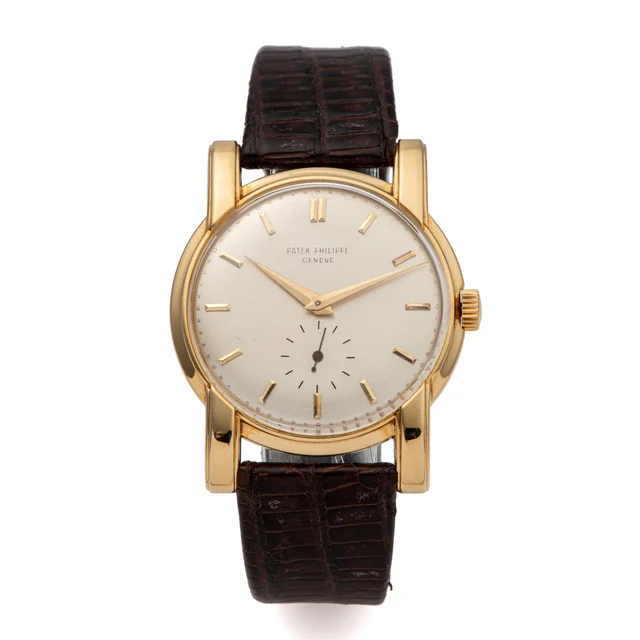 Patek Philippe PATEK PHILIPPE REF. 2428, OVERHANGING FLUTED ELONGATED STRAIGHT LUGS; 18K Y