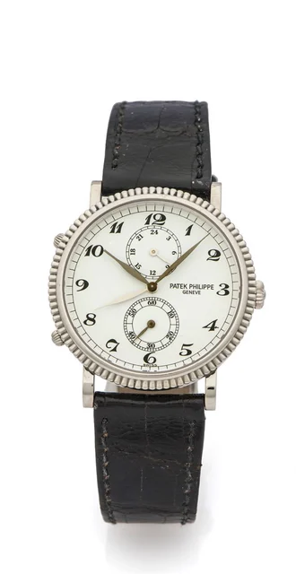 Patek Philippe PATEK PHILIPPE REF. 5034 TRAVEL TIME YELLOW GOLD RETAILED BY BEYER kol saat