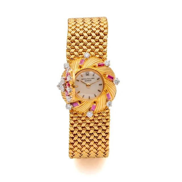 Patek Philippe Ref. 3006 / 7, ’s bracelet-watch, 18K yellow gold, diamonds and rubies kol
