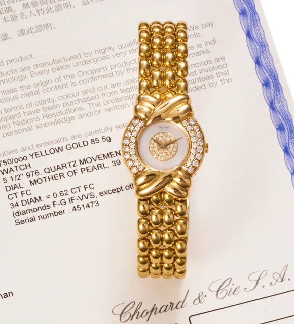 Chopard Ref. S10-6106-YDB, mother-of-pearl dial, integrated bracelet; 18K yellow gold and
