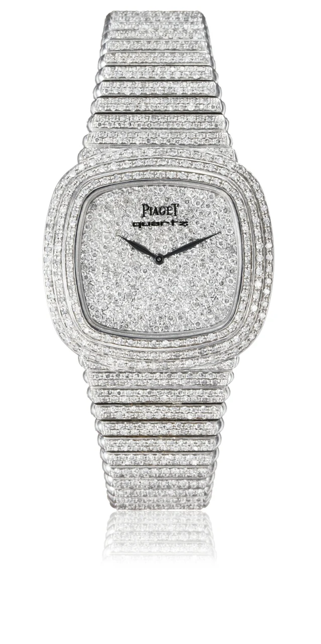 Piaget Ref. 75125 C 15, quartz, pavé-set diamond dial, diamond-set bezel and integrated bracelet; 18K white gold and diamonds kol saati