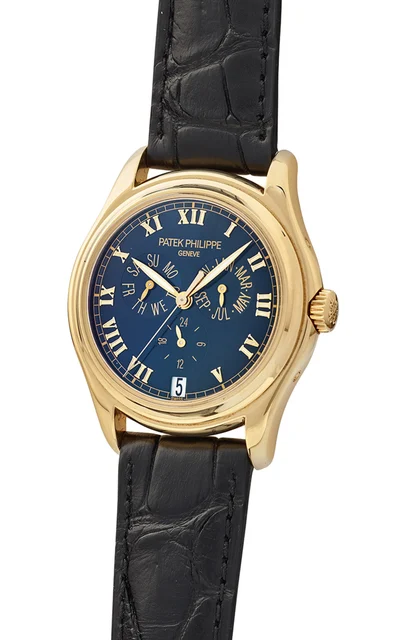 Patek Philippe PATEK PHILIPPE REF. 5035J, ANNUAL CALENDAR WITH BLACK DIAL, 18K YELLOW GOLD