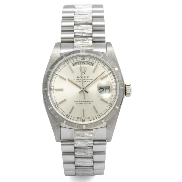 Rolex ROLEX REF. 18079 / 18000, SELF-WINDING, CENTRE-SECONDS, DATE, DAY, SILVER “SUNBURST”