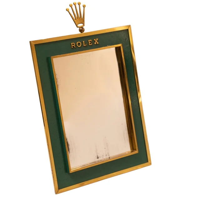 Rolex Ref. 303, display mirror for in-store use; painted and gilded metal, mirror-glass ko